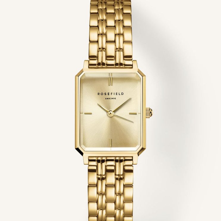 Goudkleurig Rosefield horloge met achthoekige kast op een crème achtergrond